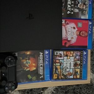 PlayStation 4 slim 1 TB with 4 games and headset